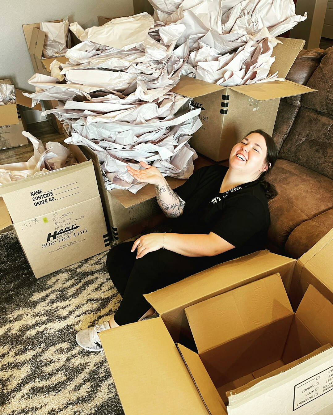 Older Latin American man organizing paper documents in folders at a table