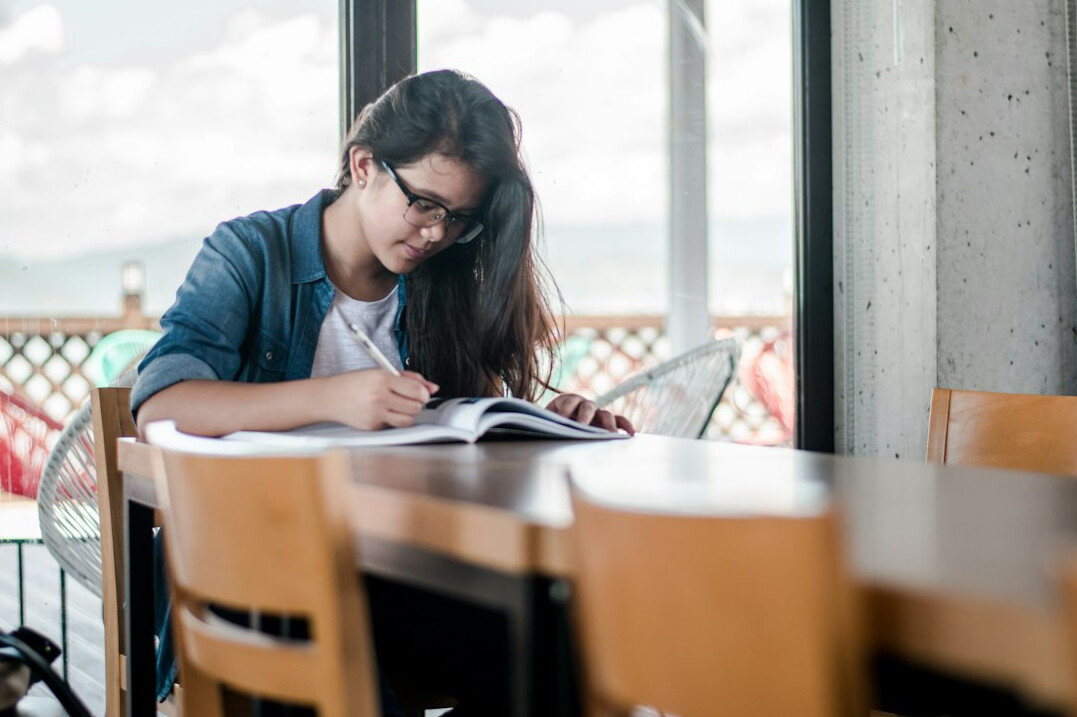 person studying financial books