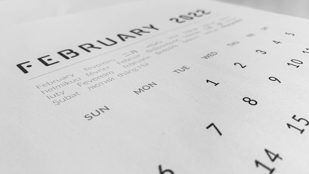 Printed monthly budget template with calculator and colored pens